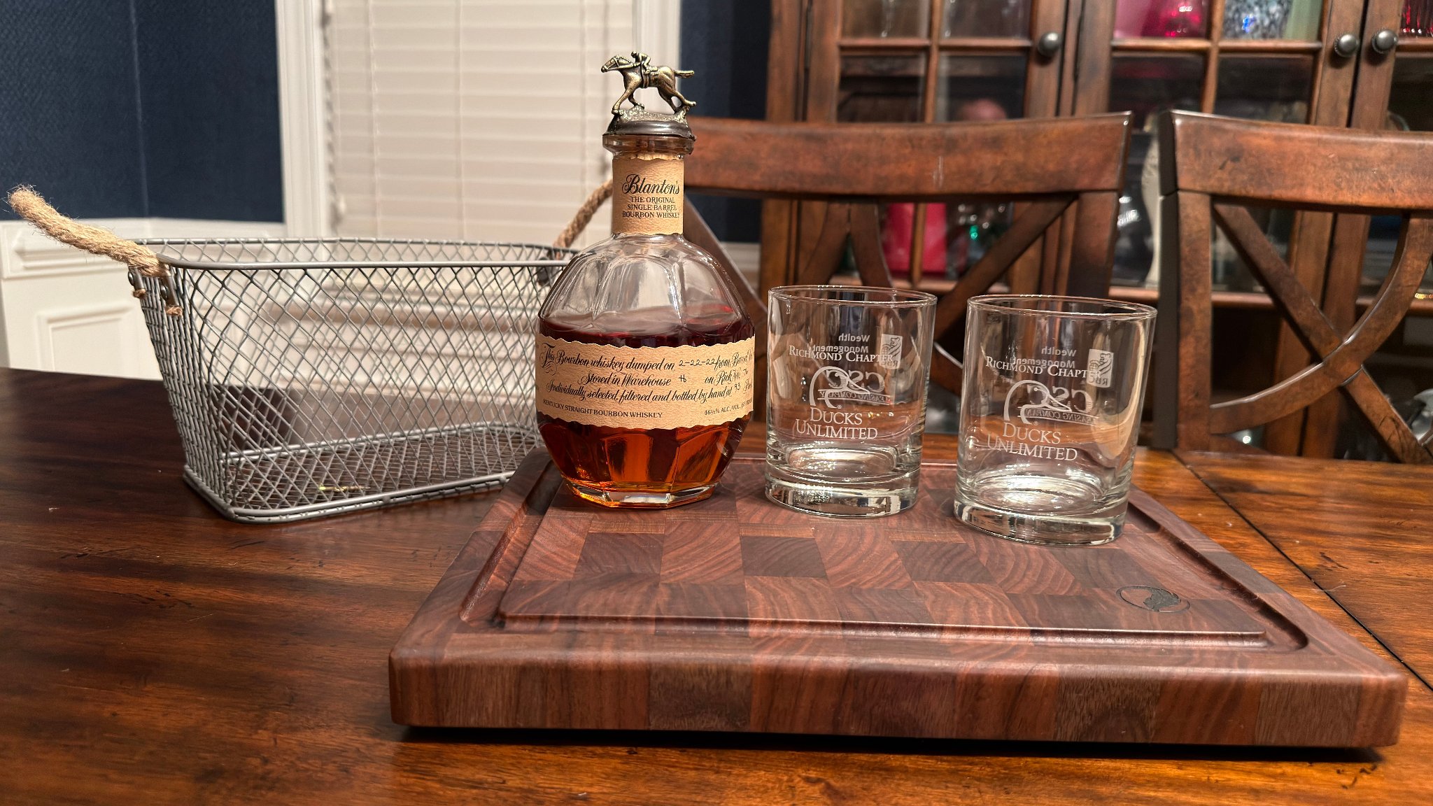End-grain walnut charcuterie board with Blantons bourbon and Ducks Unlimited glasses